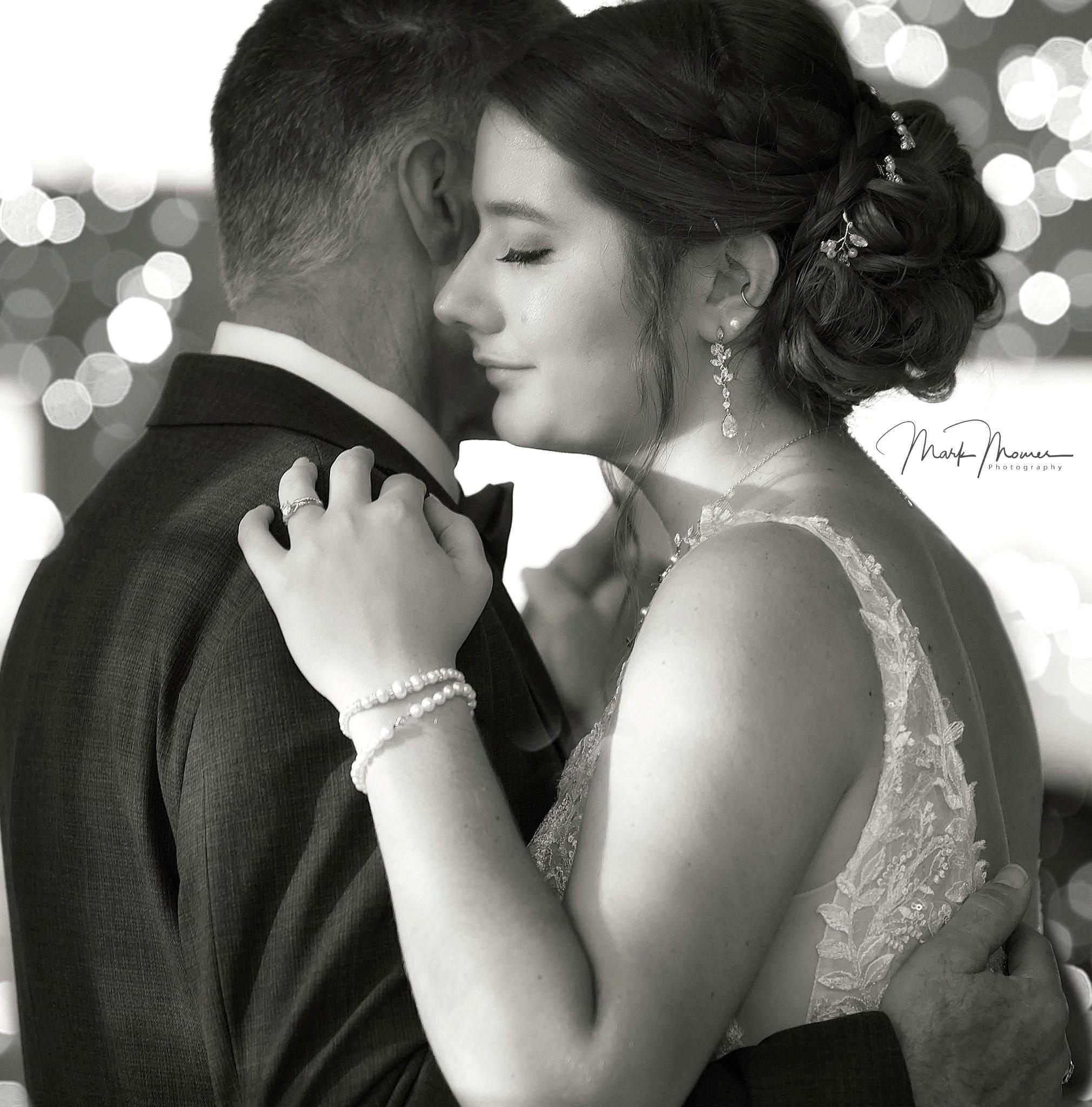 Bride first dance — intimate bokeh portrait